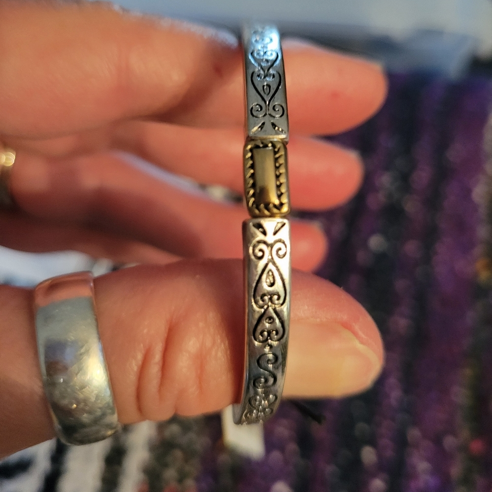 Howards silver and gold tone stretchy bracelet